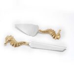Cake cutter inspired by seahorse in brass and stainless steel is the ideal cutlery set for giting or cake cutting. Order the Prata Cake Knife Set for delivery.